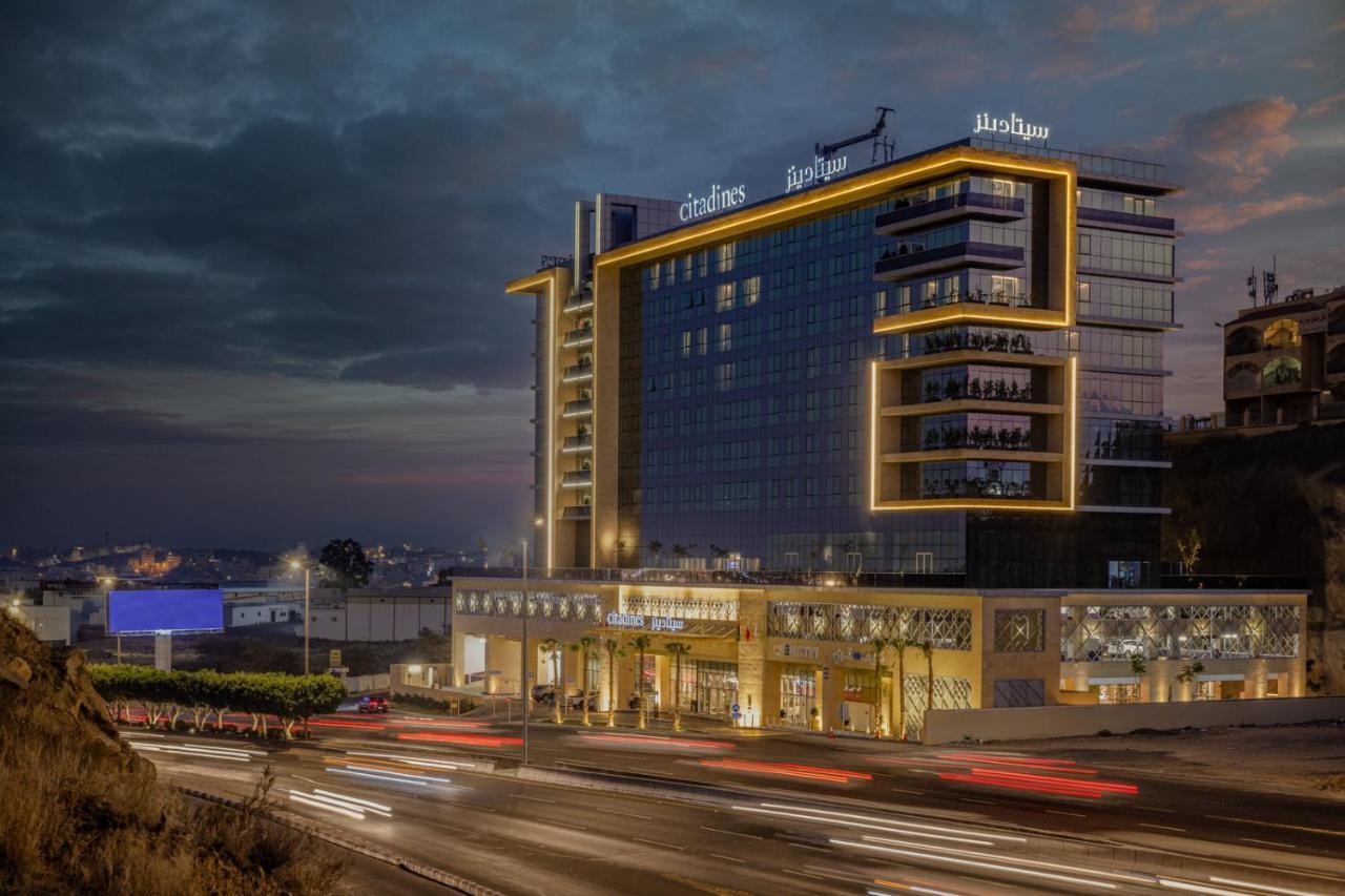 Citadines Abha Aparthotel Εξωτερικό φωτογραφία The hotel at night